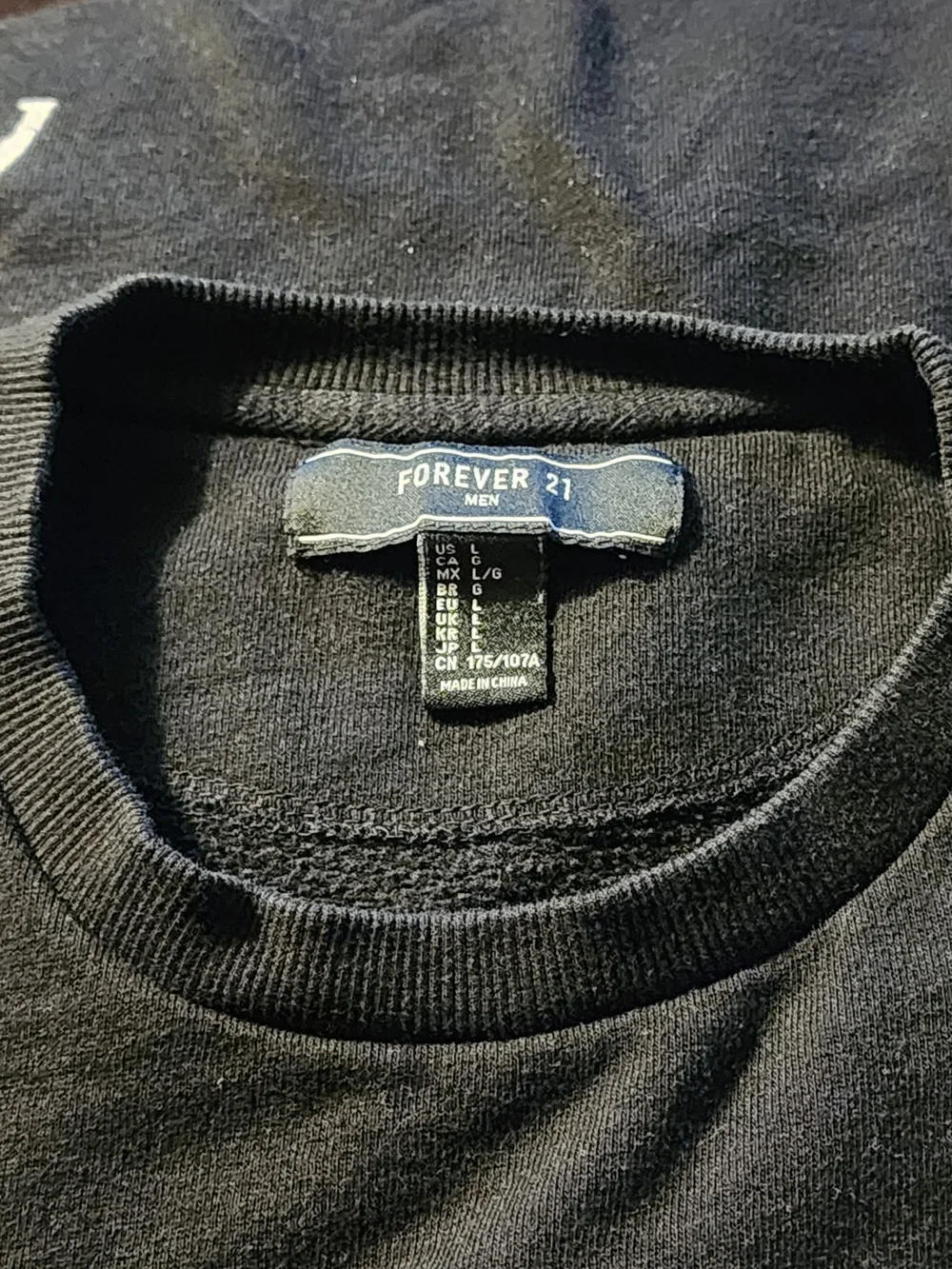 Forever 21 Black Crewneck Sweater with White Bulldog Embroidery